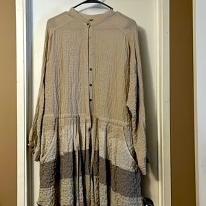 Button front natural in color with tie waist dress.